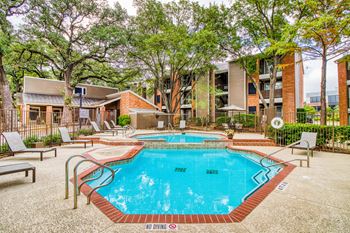 Our apartments have a large pool and lounge chairs